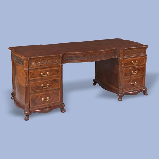 A Mahogany Serpentine Fronted Desk